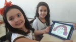 Trabalhando as partes do corpo em Inglês com os alunos do 2°ano azul e verde.